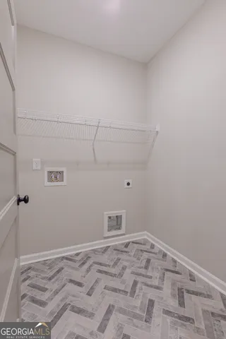 a view of a livingroom with a ceiling fan and window