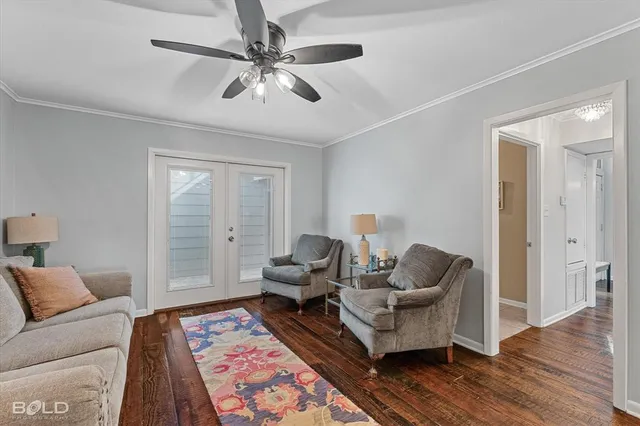 a living room with furniture and a rug