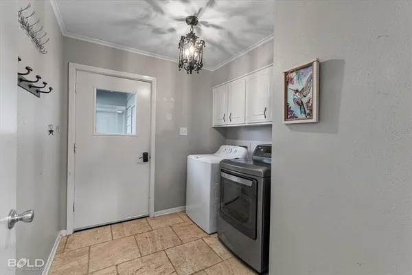 a view of a utility room with a washer and dryer