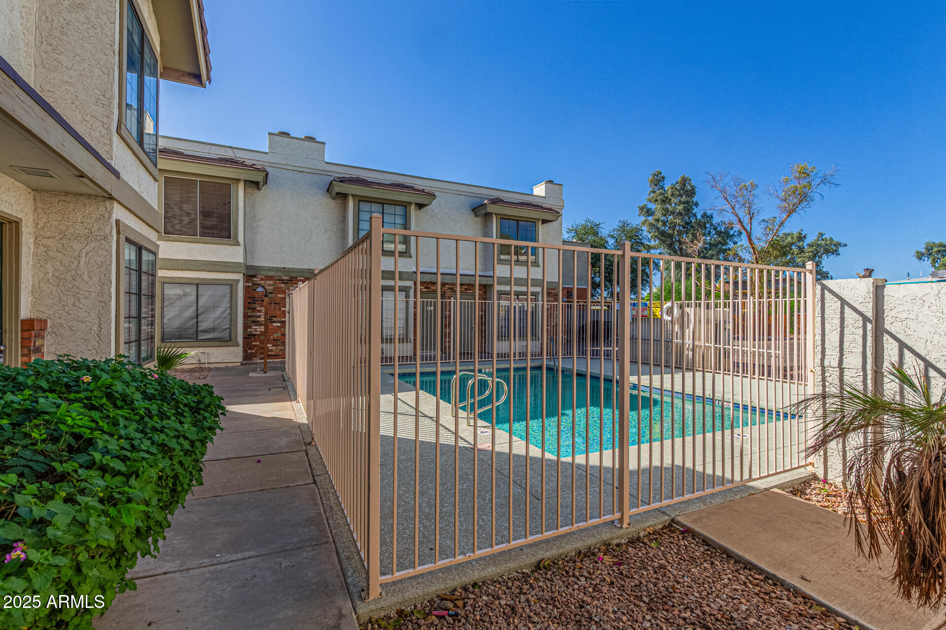 548 South Wilson Street, Unit 104 Tempe, AZ 85281 - Photo 17 of 18 a view of a wrought iron fences in front of house