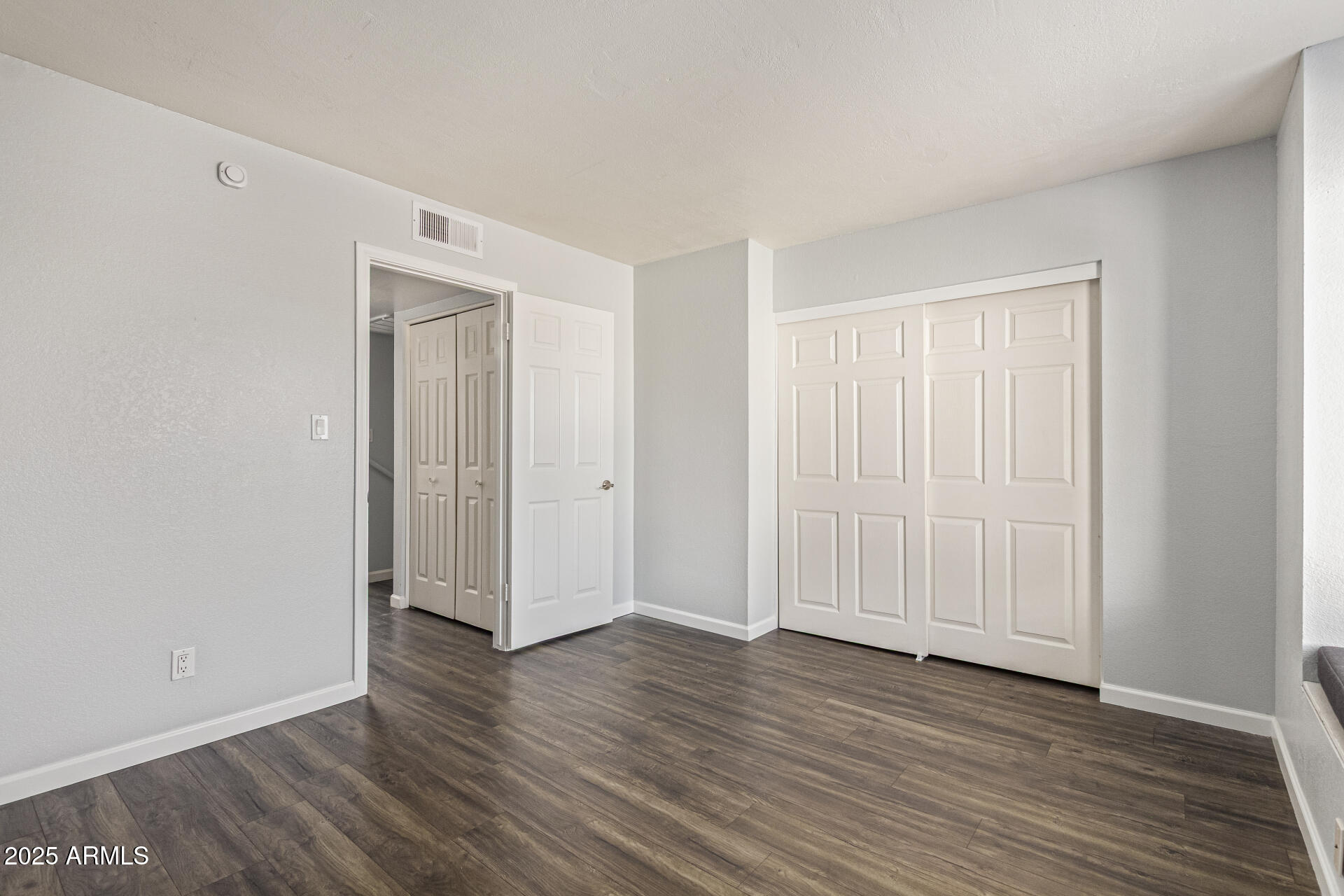 548 South Wilson Street, Unit 104 Tempe, AZ 85281 - Photo 8 of 18 a view of empty room with wooden floor