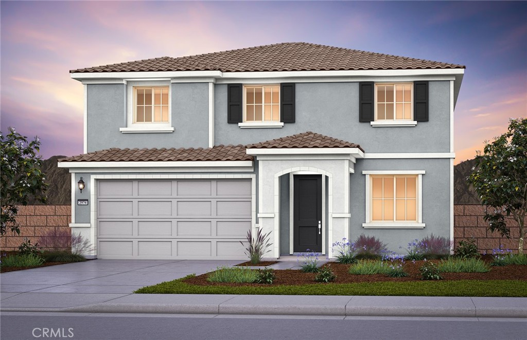 25424 Picket Range Street Menifee, CA 92586 - Photo 1 of 1 a front view of a house with a yard and garage