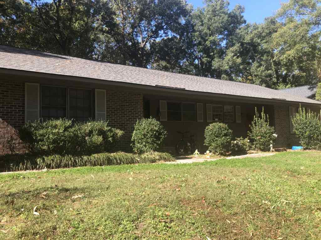 1709 Quail Ridge Road Raleigh, NC 27609 - Photo 3 of 14 a view of a garden with plants