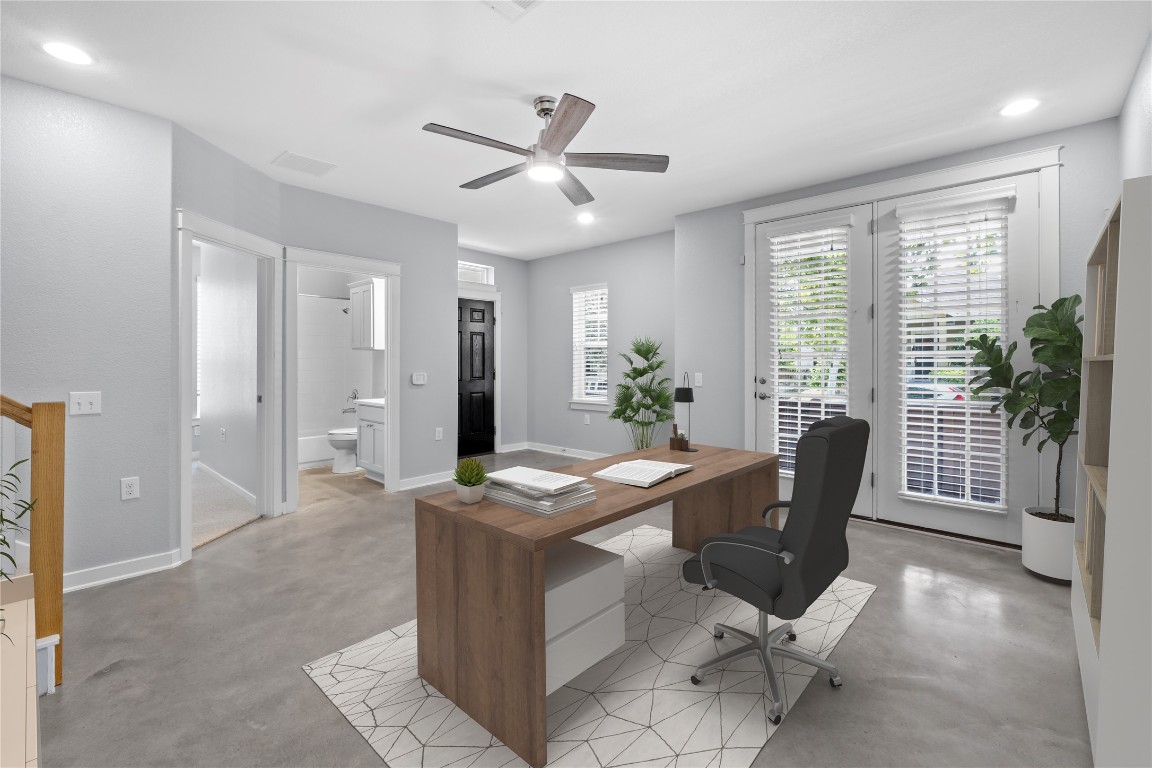 3900 Threadgill Street, Unit 16 Austin, TX 78723 - Photo 21 of 40 a dining room with furniture and window