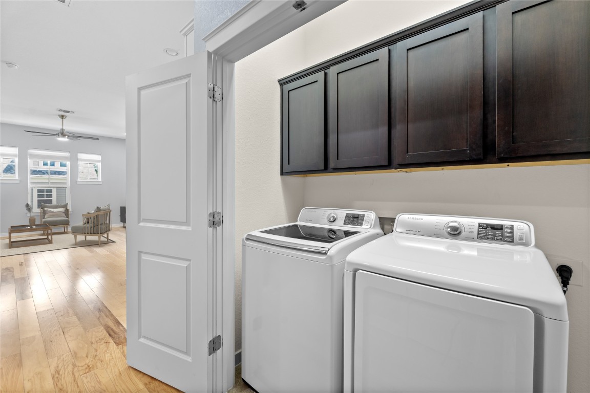 3900 Threadgill Street, Unit 16 Austin, TX 78723 - Photo 24 of 40 a utility room with dryer and washer