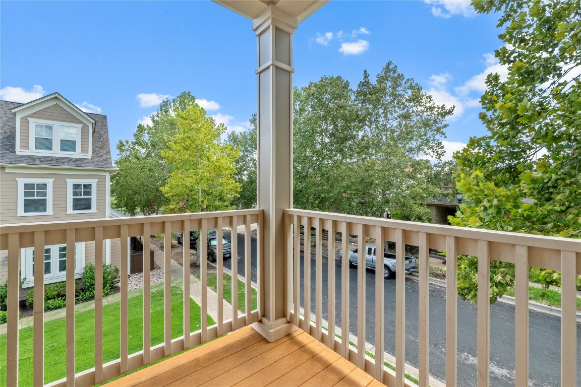 3900 Threadgill Street, Unit 16 Austin, TX 78723 - Photo 26 of 40 a view of balcony with wooden floor