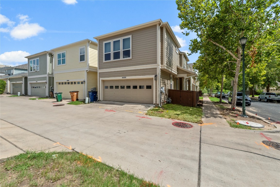 3900 Threadgill Street, Unit 16 Austin, TX 78723 - Photo 30 of 40 a view of a building with a street