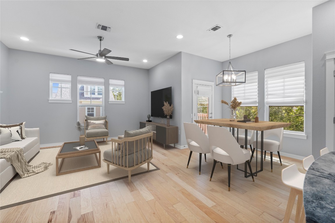 3900 Threadgill Street, Unit 16 Austin, TX 78723 - Photo 3 of 40 a living room with furniture a window and a flat screen tv