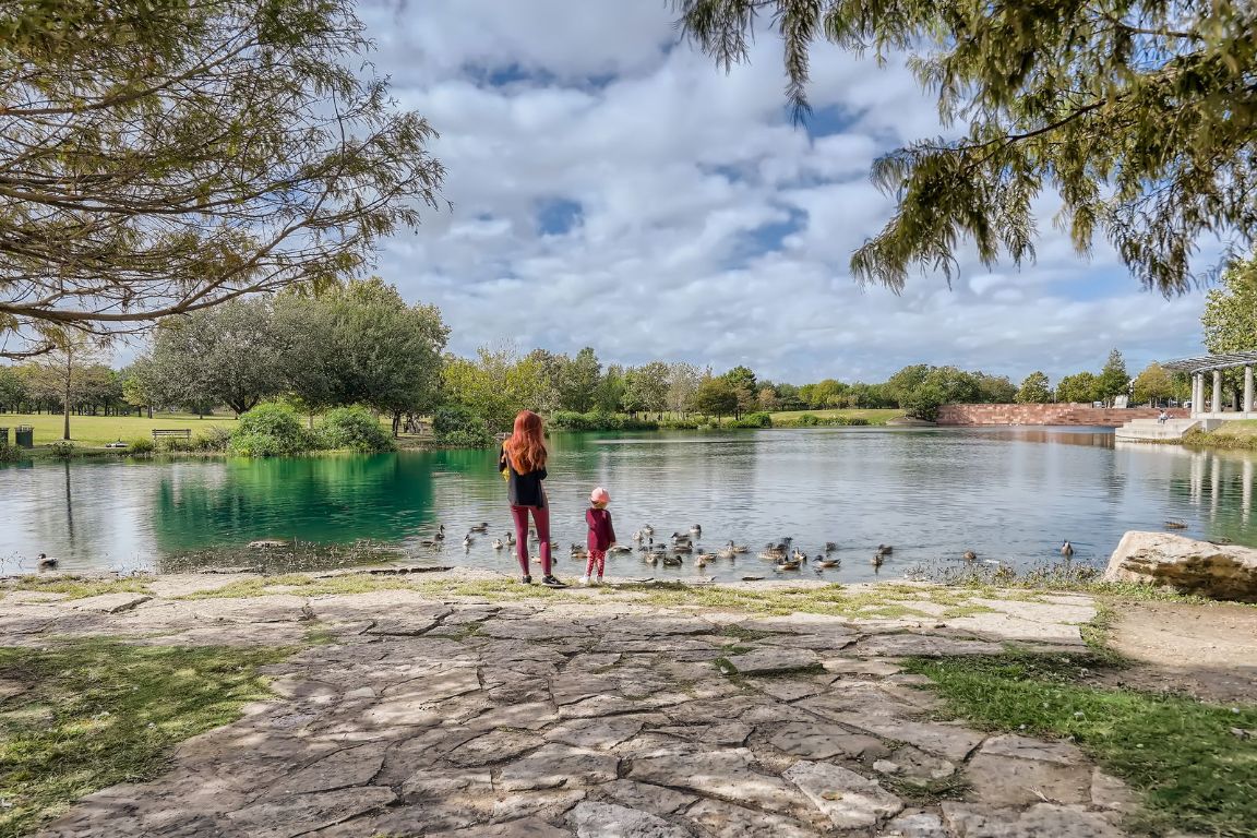 3900 Threadgill Street, Unit 16 Austin, TX 78723 - Photo 38 of 40 a view of a lake with a beach