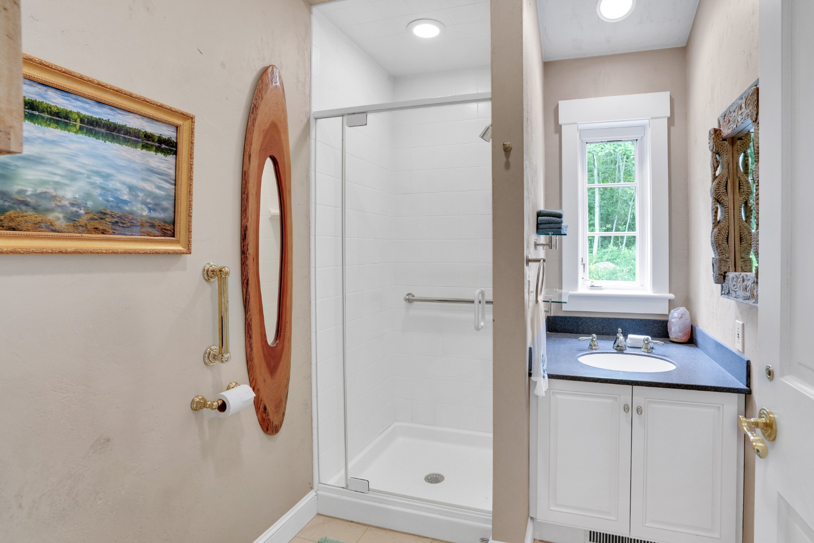 300 N Road Chilmark, MA 02535 - Photo 16 of 39 a bathroom with a granite countertop sink a window and a shower