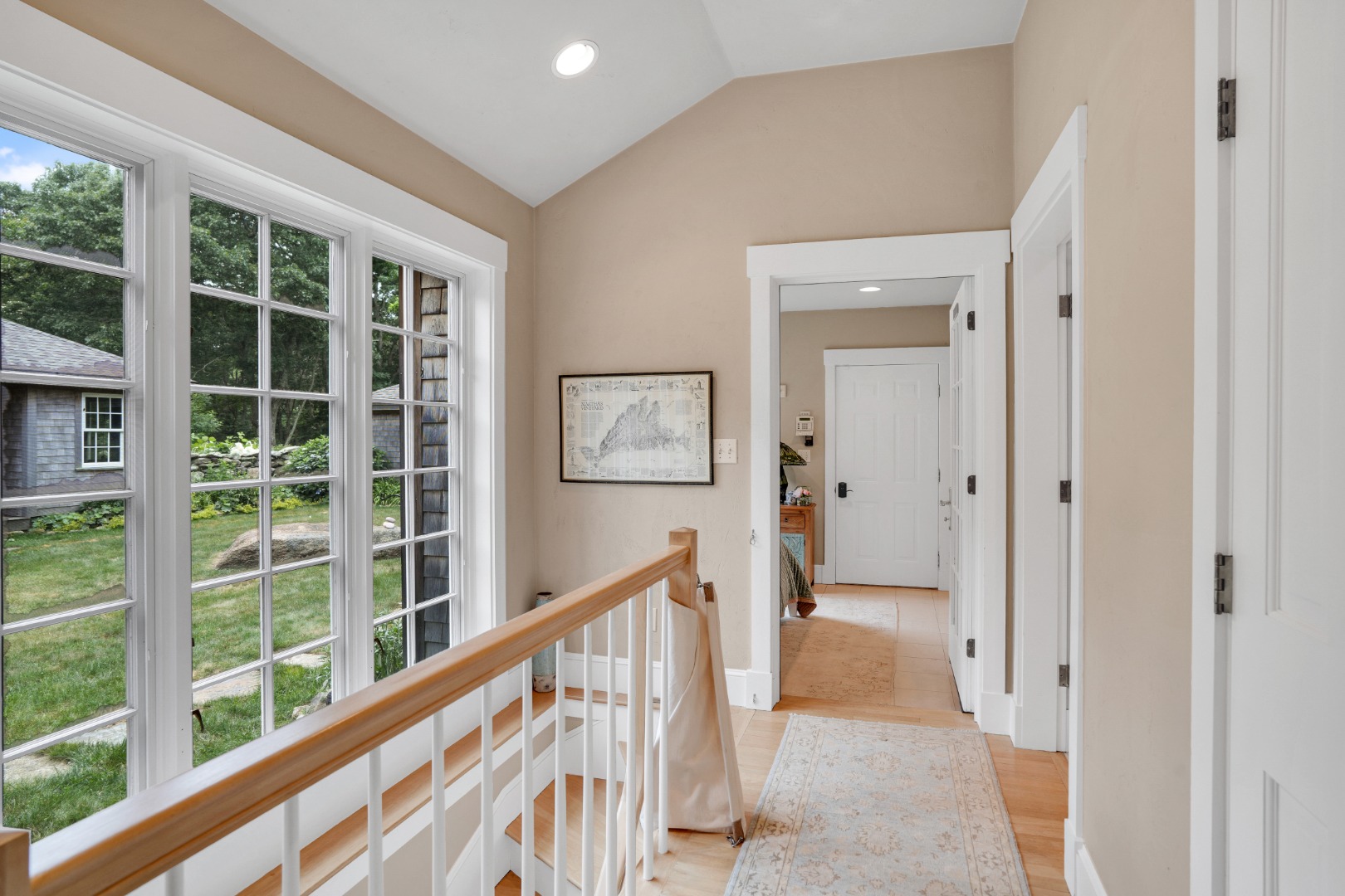 300 N Road Chilmark, MA 02535 - Photo 22 of 39 a view of a hallway with windows and stairs