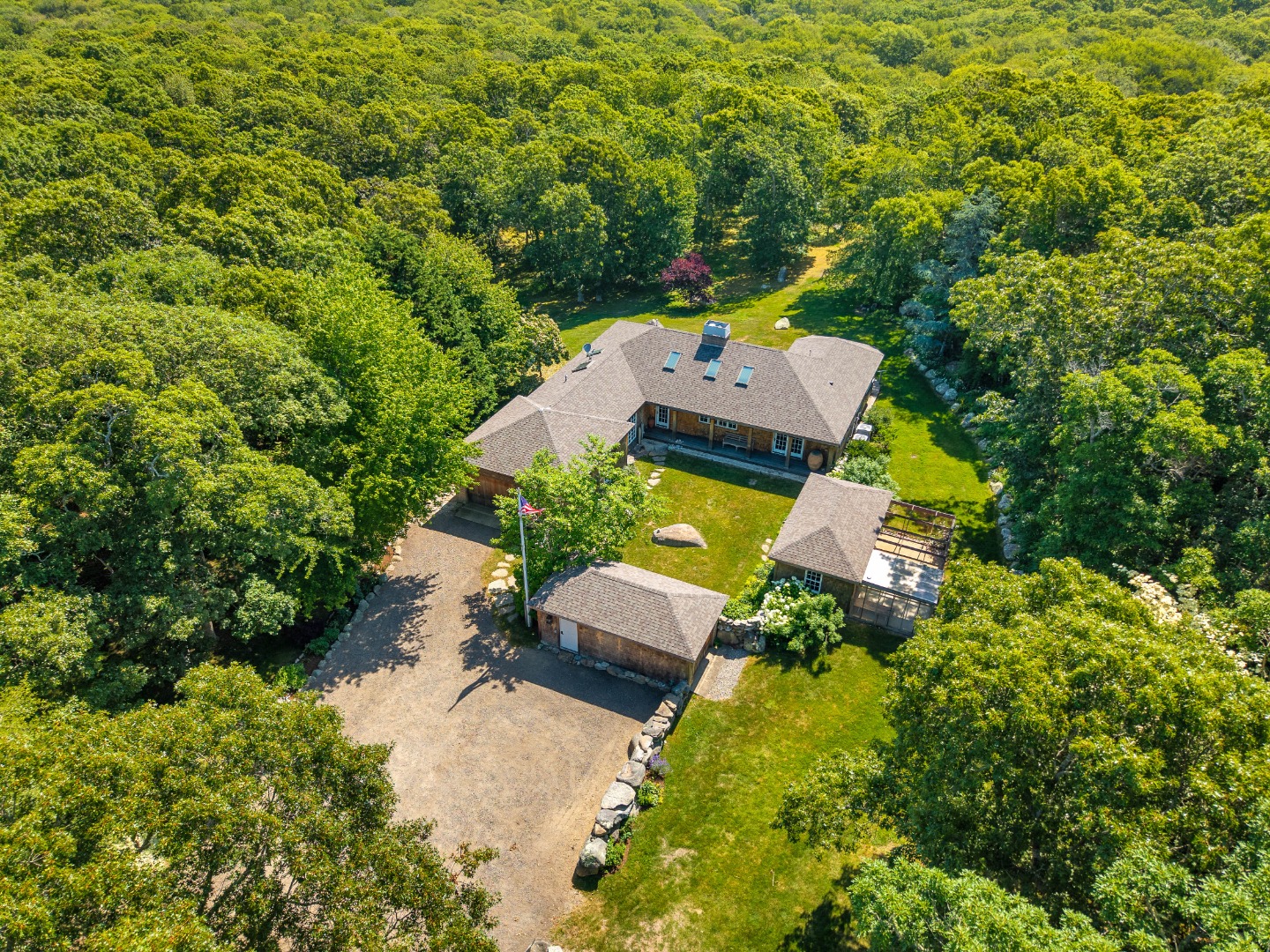 300 N Road Chilmark, MA 02535 - Photo 29 of 39 an aerial view of a house with a yard