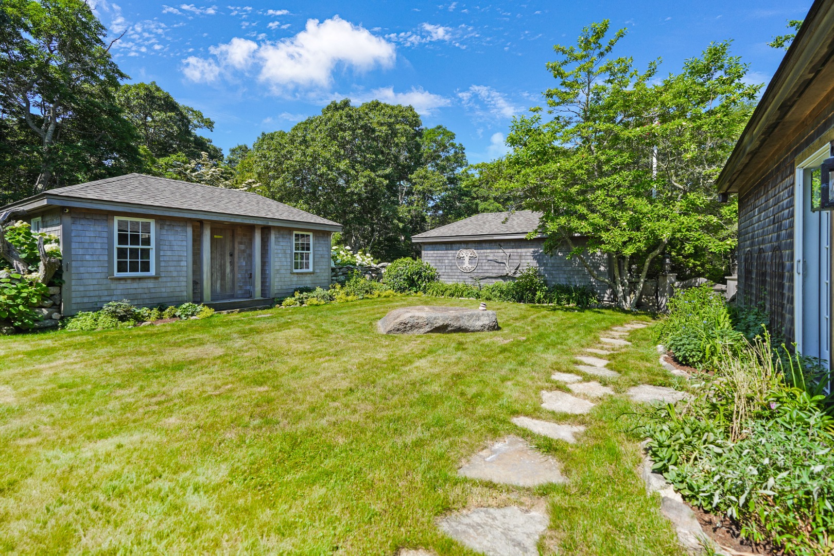 300 N Road Chilmark, MA 02535 - Photo 32 of 39 a view of a house with pool and garden