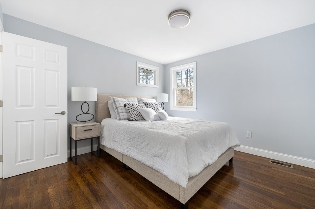 217 Marked Tree Road Holliston, MA 01746 - Photo 18 of 30 a bedroom with a bed and a window