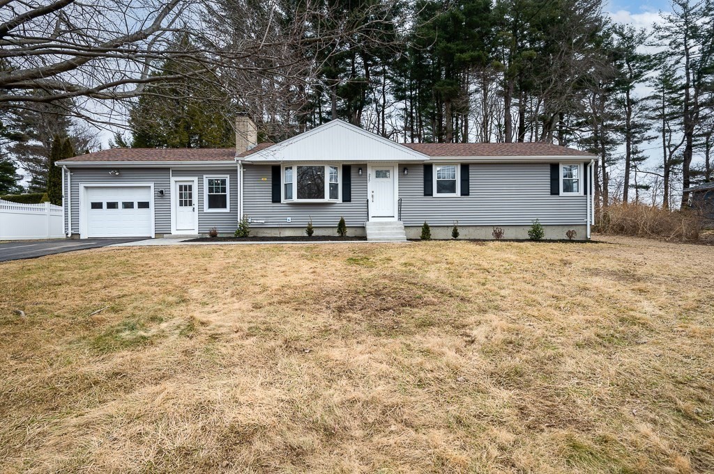 217 Marked Tree Road Holliston, MA 01746 - Photo 2 of 30 a front view of a house with a yard
