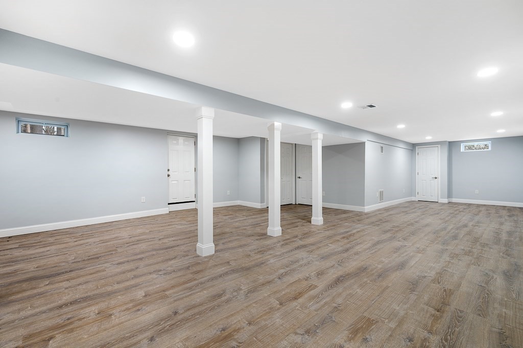 217 Marked Tree Road Holliston, MA 01746 - Photo 26 of 30 a view of an empty room with wooden floor