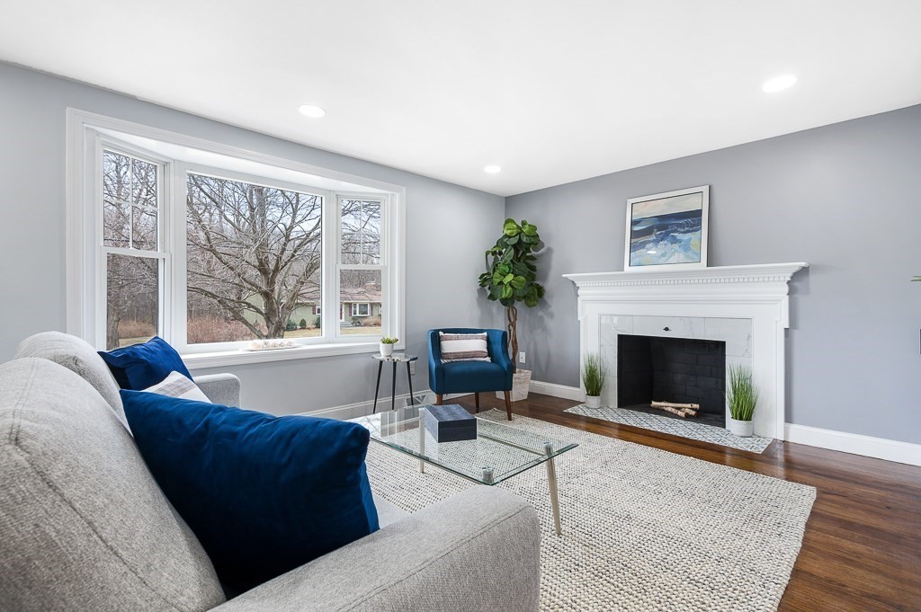 217 Marked Tree Road Holliston, MA 01746 - Photo 4 of 30 a living room with furniture and a fireplace