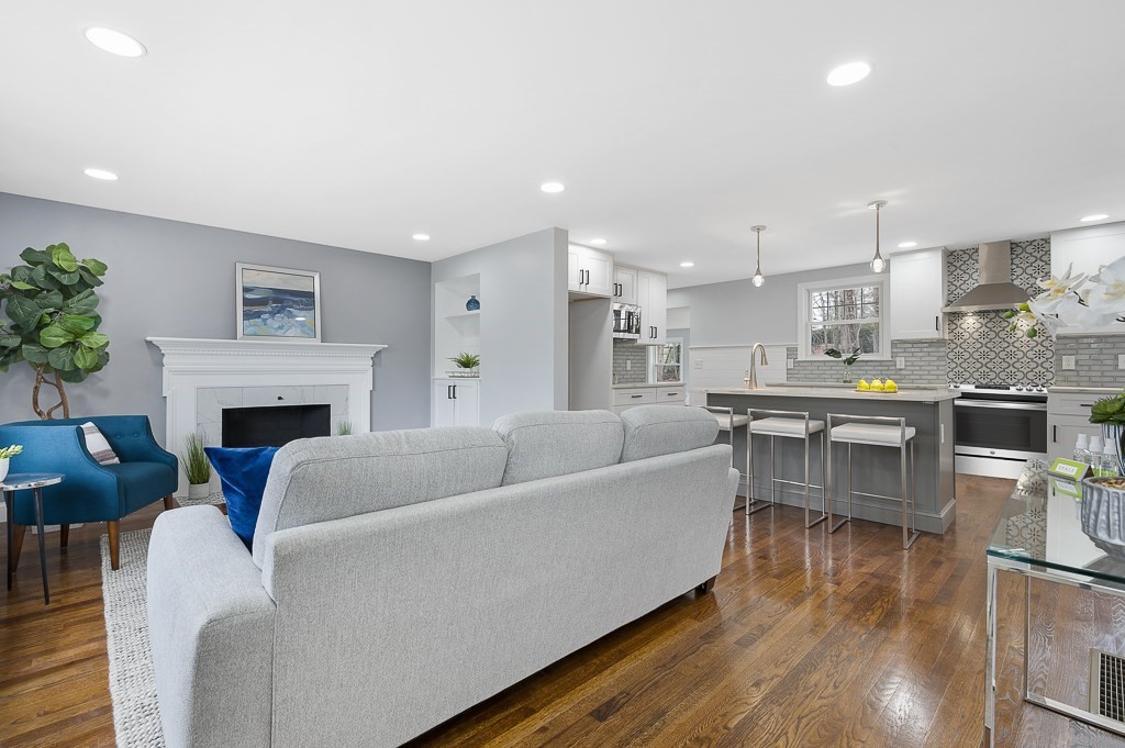 217 Marked Tree Road Holliston, MA 01746 - Photo 7 of 30 a living room with furniture and a fireplace