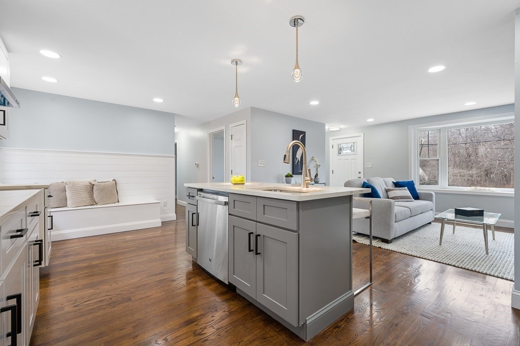 217 Marked Tree Road Holliston, MA 01746 - Photo 8 of 30 a kitchen with counter top space and living room