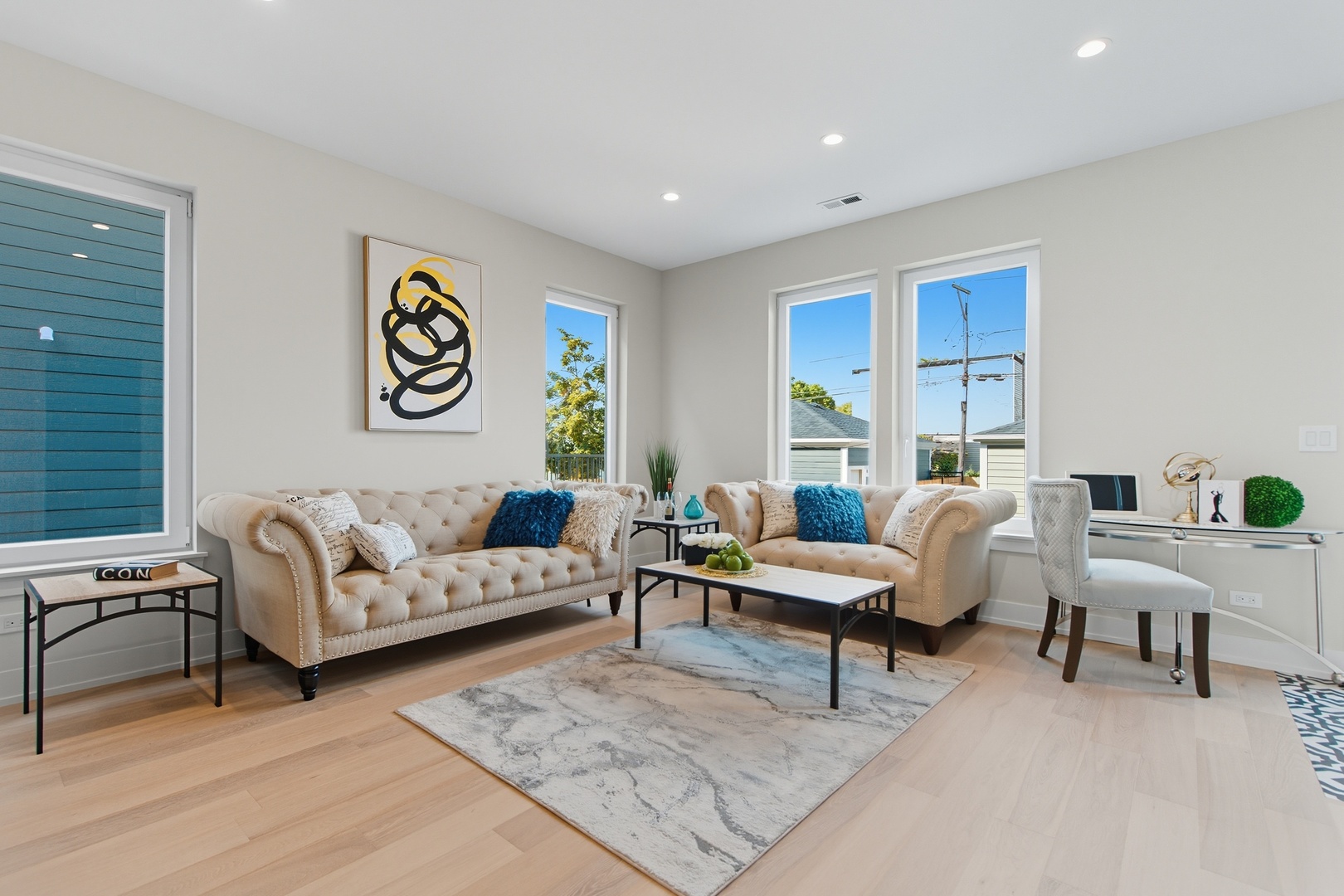 5254 West Newport Avenue Chicago, IL 60641 - Photo 11 of 27 a living room with furniture and a window