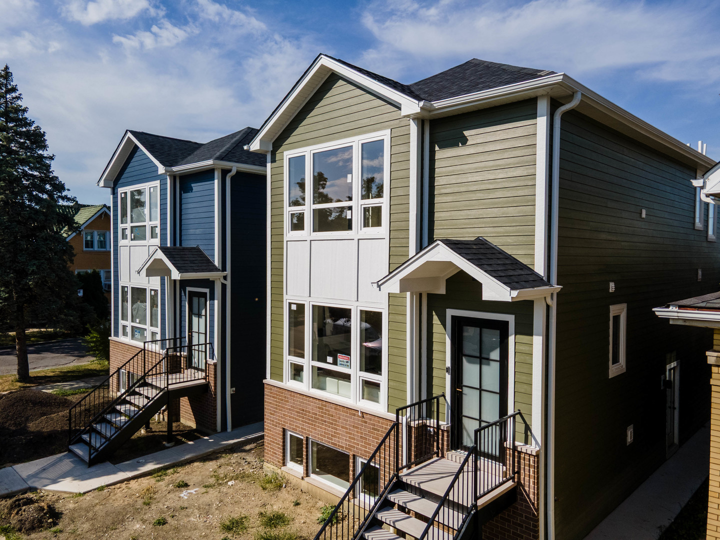 5254 West Newport Avenue Chicago, IL 60641 - Photo 27 of 27 a front view of a house with a yard
