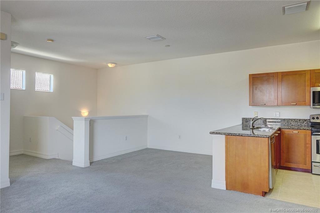 63 Southeast Palermo, Unit 202 Stuart, FL 34994 - Photo 12 of 30 a view of a storage & utility room