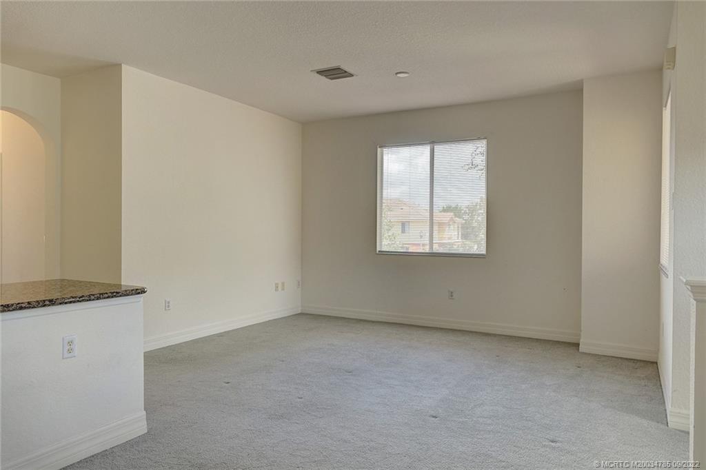 63 Southeast Palermo, Unit 202 Stuart, FL 34994 - Photo 15 of 30 an empty room with windows
