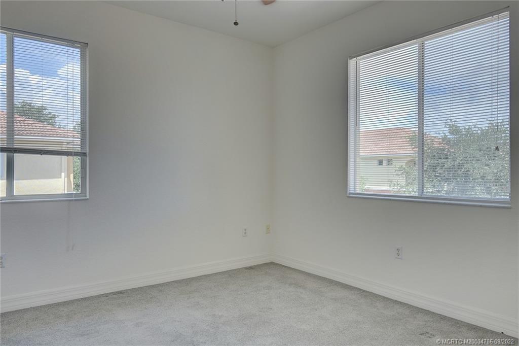 63 Southeast Palermo, Unit 202 Stuart, FL 34994 - Photo 25 of 30 an empty room with a window