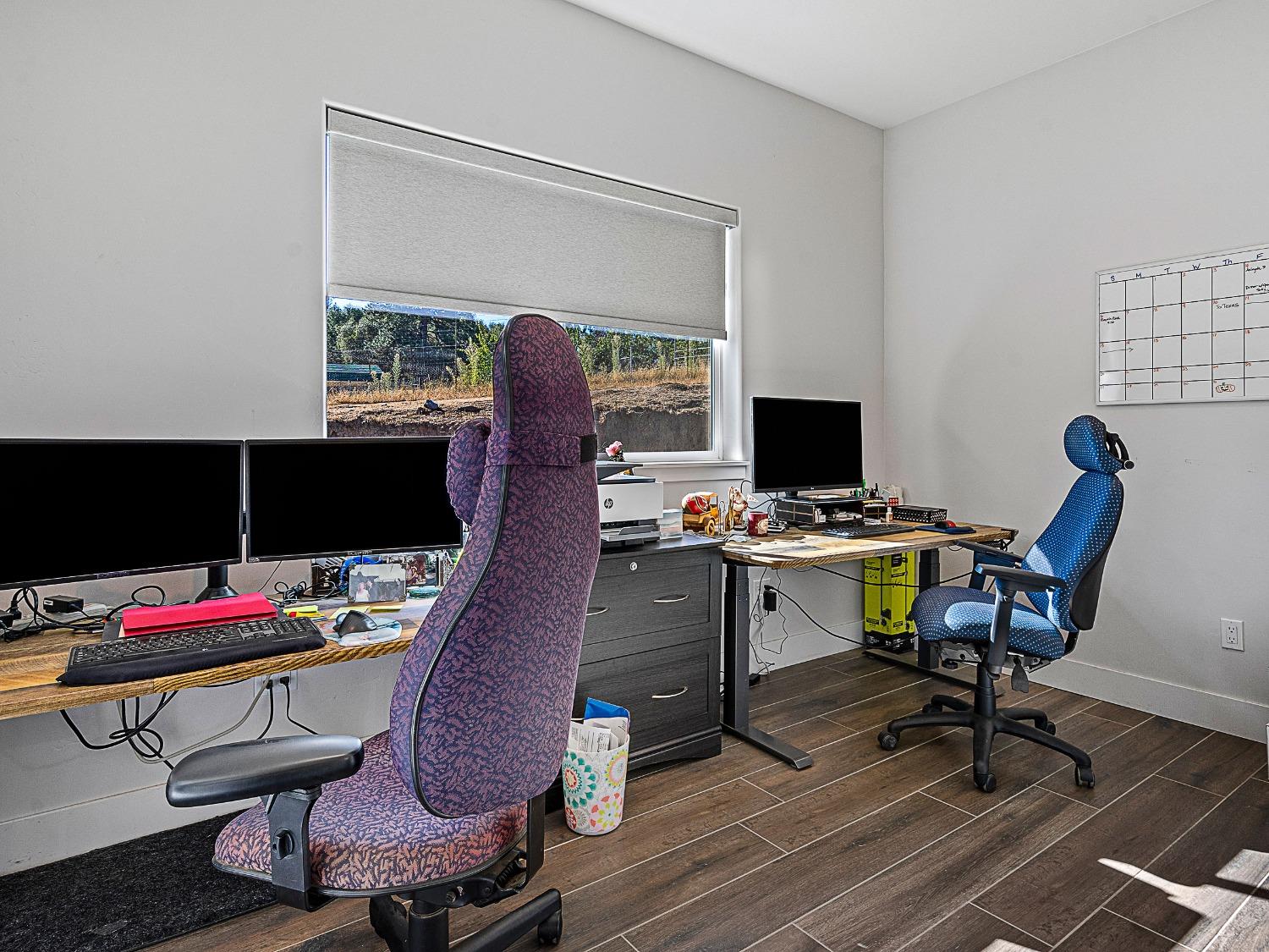 3102 Squirrel Hollow Mount Aukum, CA 95656 - Photo 19 of 51 a view of a workspace with furniture and wooden floor