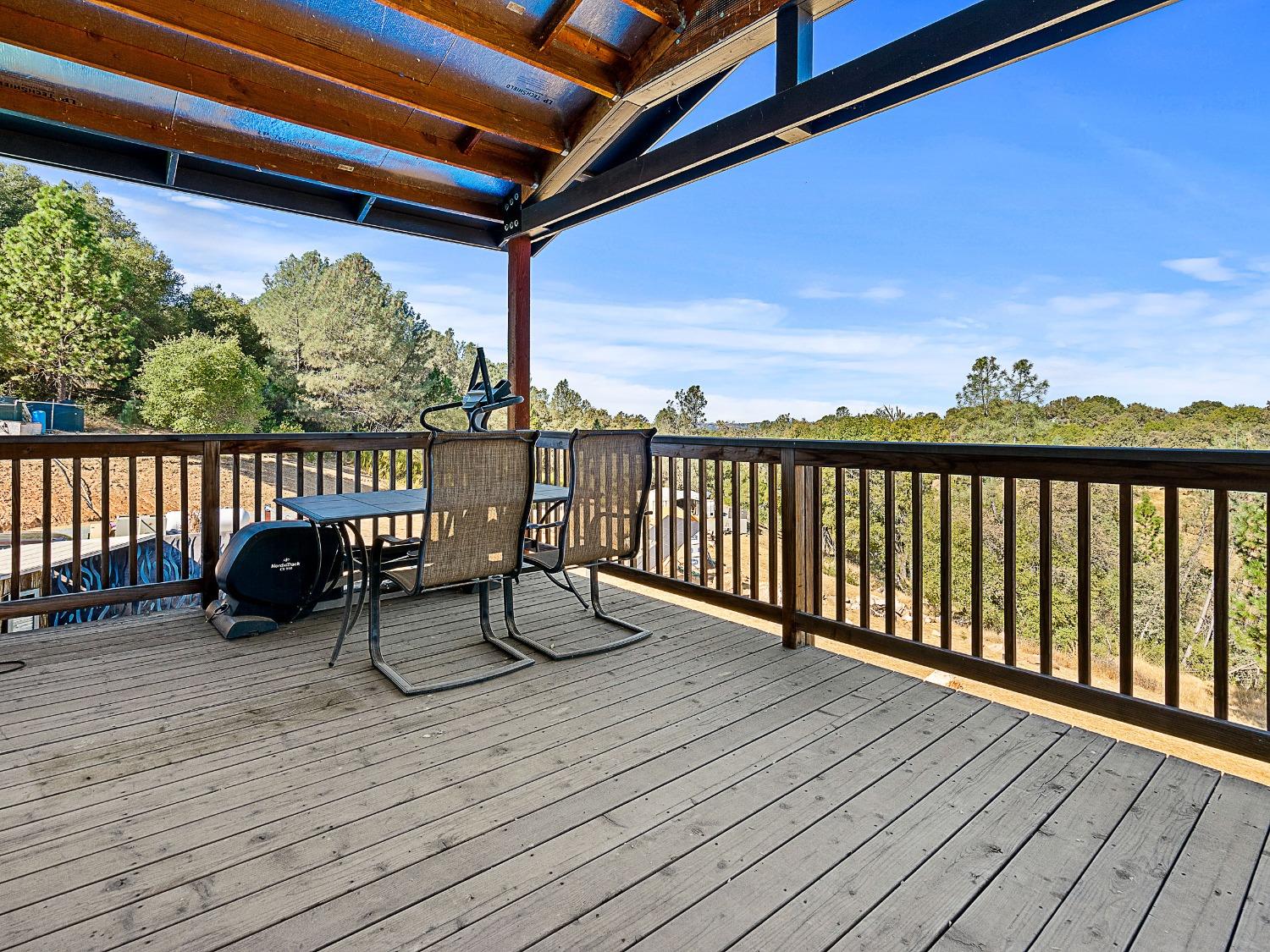 3102 Squirrel Hollow Mount Aukum, CA 95656 - Photo 34 of 51 a view of balcony with wooden floor and seating space