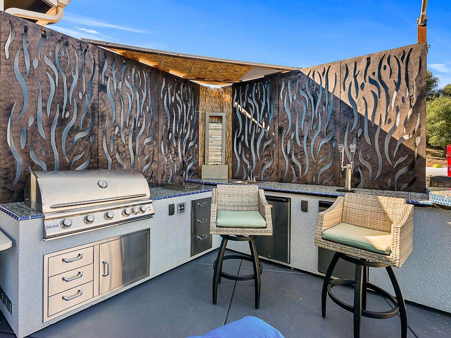 3102 Squirrel Hollow Mount Aukum, CA 95656 - Photo 39 of 51 a kitchen with a stove and a table