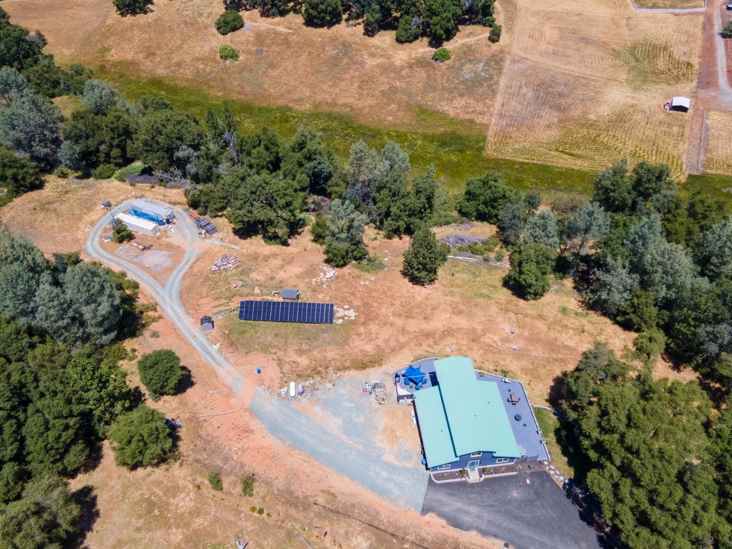 3102 Squirrel Hollow Mount Aukum, CA 95656 - Photo 51 of 51 an aerial view of a house with a yard