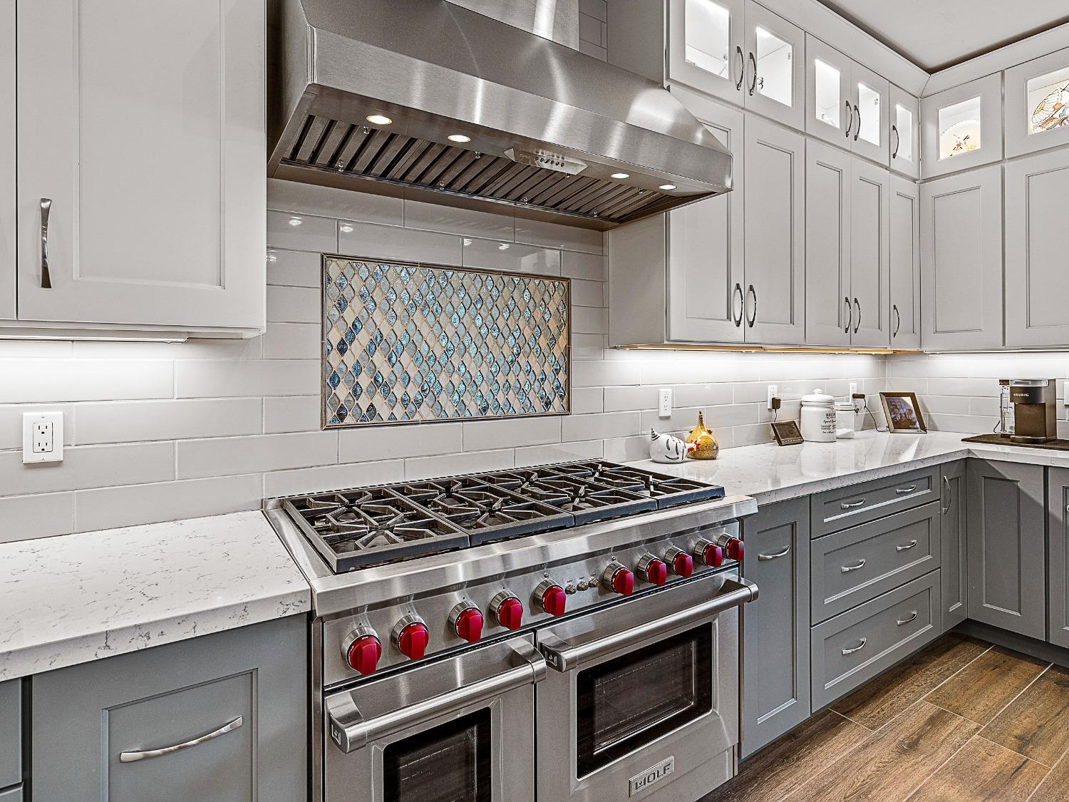 3102 Squirrel Hollow Mount Aukum, CA 95656 - Photo 8 of 51 a kitchen with stainless steel appliances granite countertop a stove and a sink