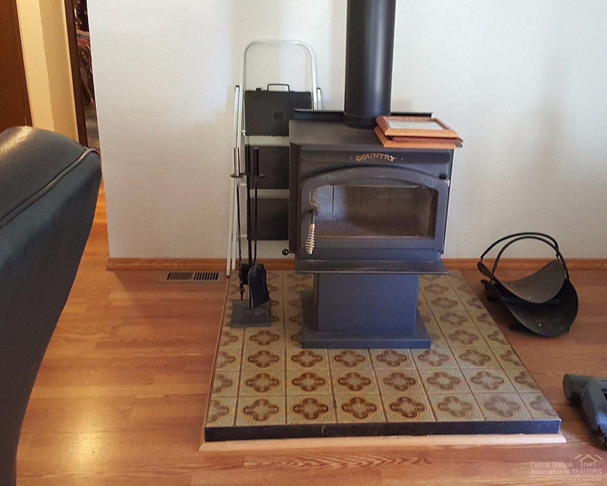 60099 Cinder Butte Road Bend, OR 97702 - Photo 10 of 21 Country wood stove was installed in 2011