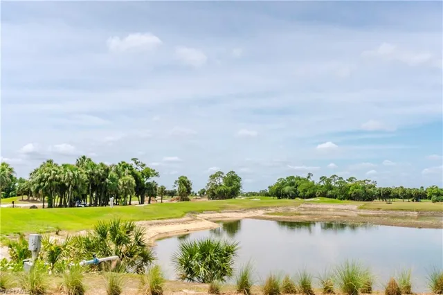a view of a lake with a big yard