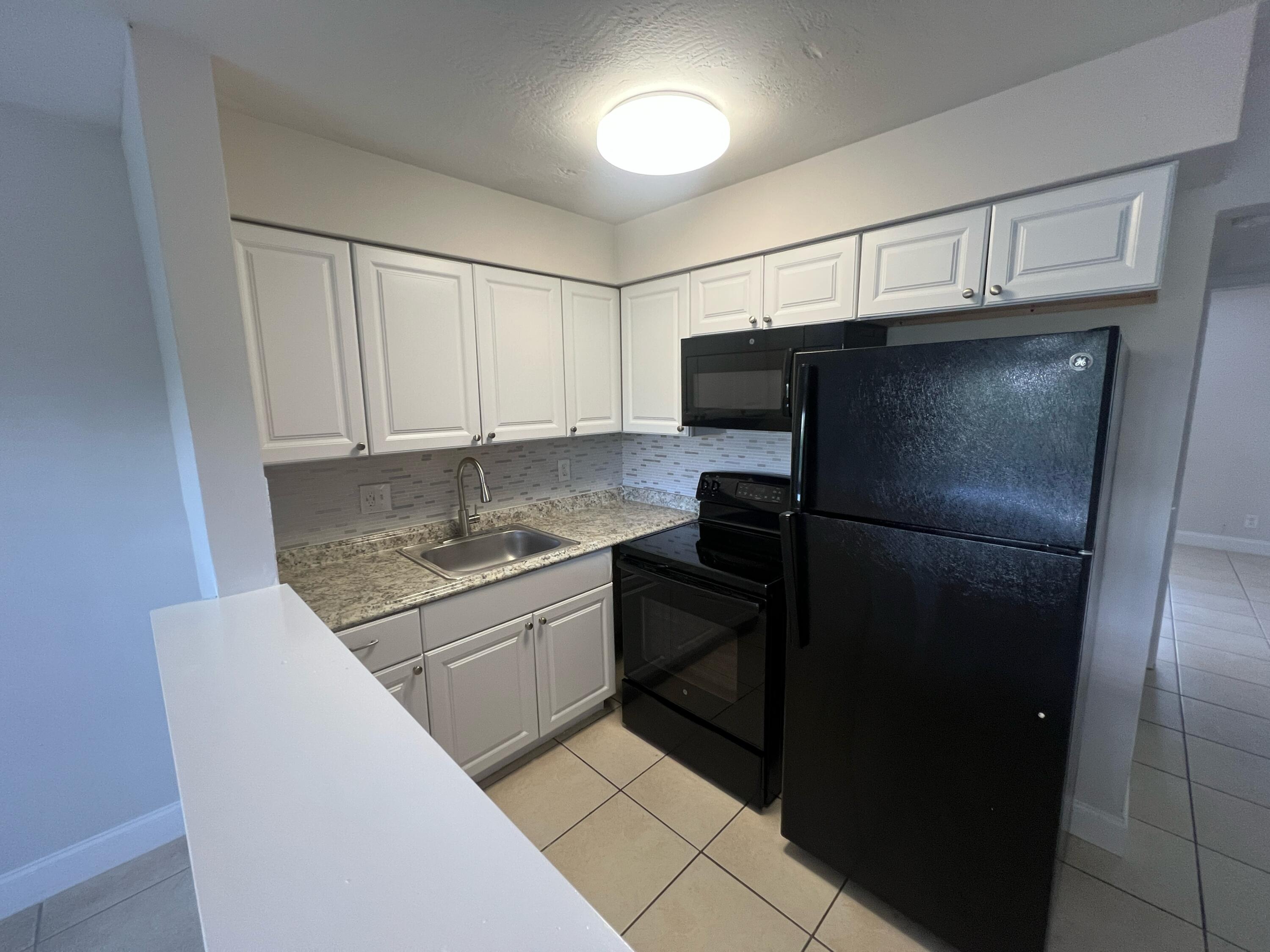 4670 Northeast 5th Avenue, Unit 5 Boca Raton, FL 33431 - Photo 8 of 8 IMG_6910