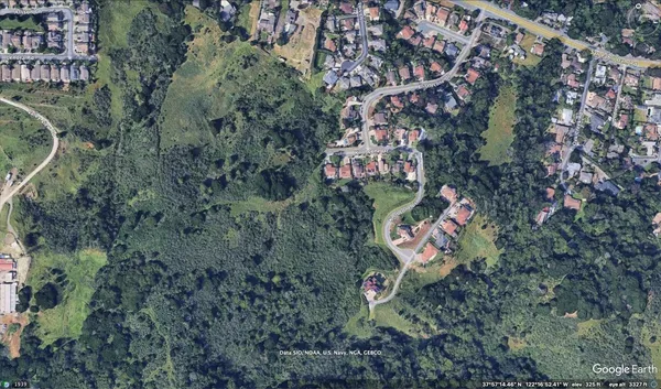 a view of a lake with mountains in the back