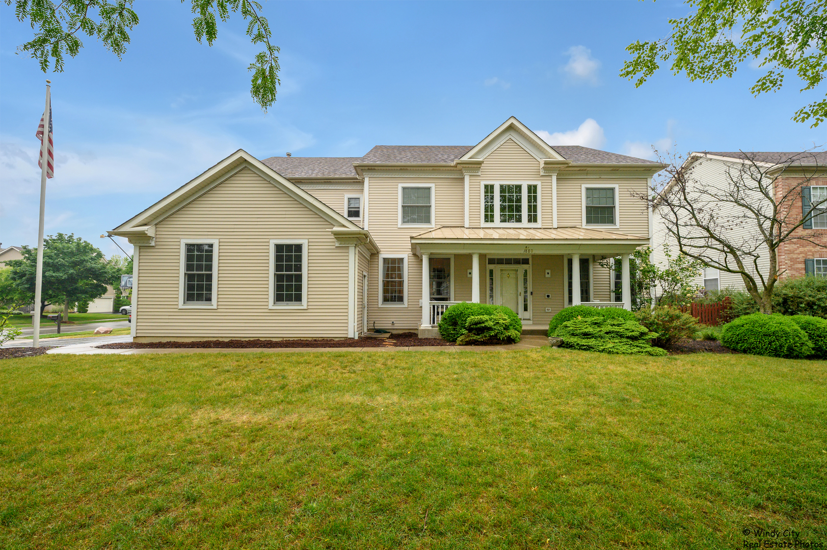 1880 Crofton Drive Algonquin, IL 60102 - Photo 1 of 44 a front view of a house with a yard