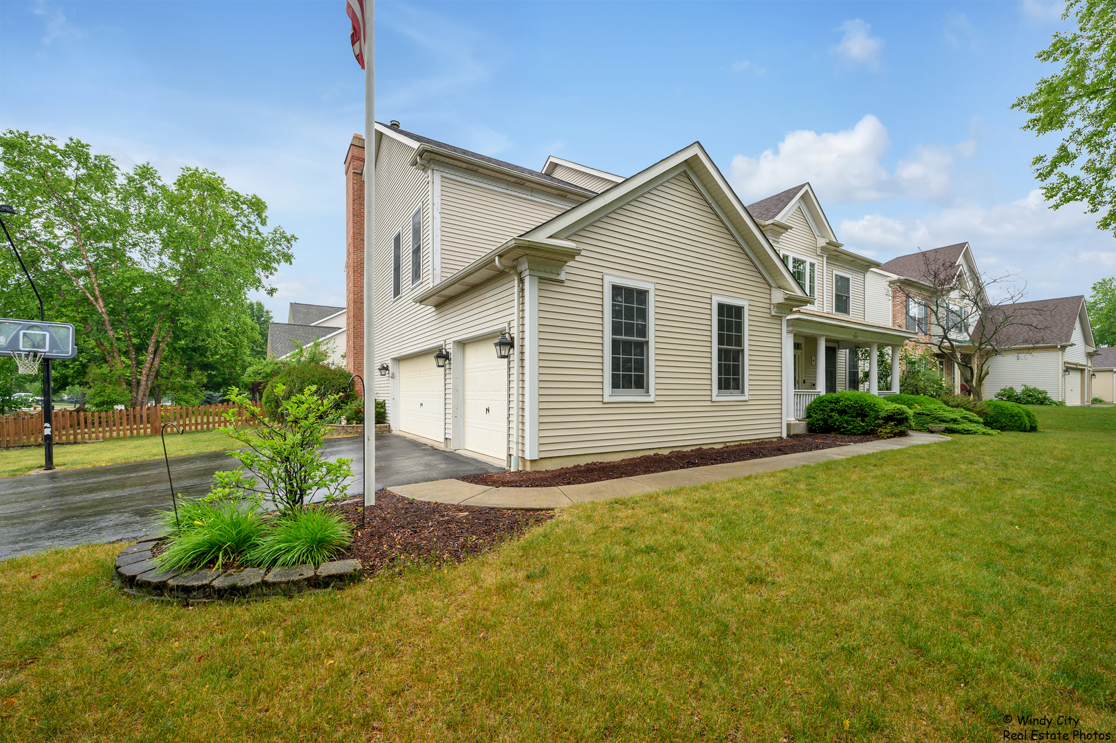 1880 Crofton Drive Algonquin, IL 60102 - Photo 2 of 44 a view of a house with backyard and garden