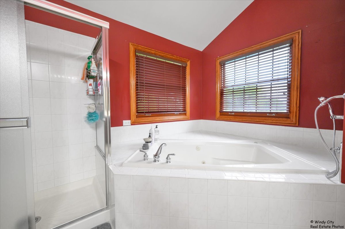 1880 Crofton Drive Algonquin, IL 60102 - Photo 23 of 44 a white bath tub sitting next to a window