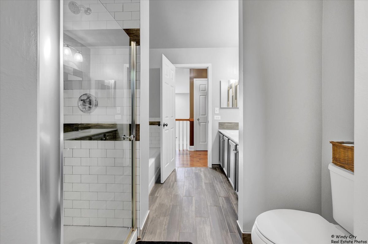 1880 Crofton Drive Algonquin, IL 60102 - Photo 26 of 44 a bathroom with a toilet and a shower