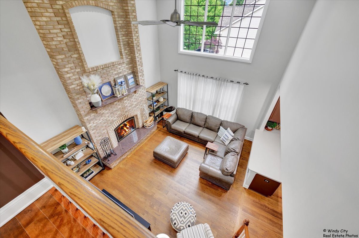 1880 Crofton Drive Algonquin, IL 60102 - Photo 29 of 44 a living room with furniture and a window