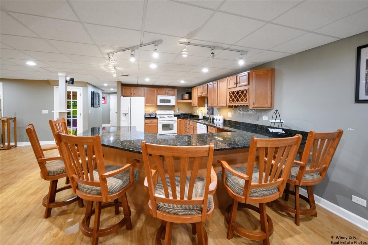 1880 Crofton Drive Algonquin, IL 60102 - Photo 32 of 44 a view of a dining room with furniture