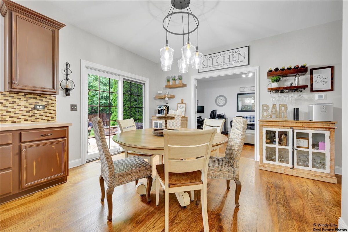 1880 Crofton Drive Algonquin, IL 60102 - Photo 9 of 44 a view of a dining room with furniture window and outside view