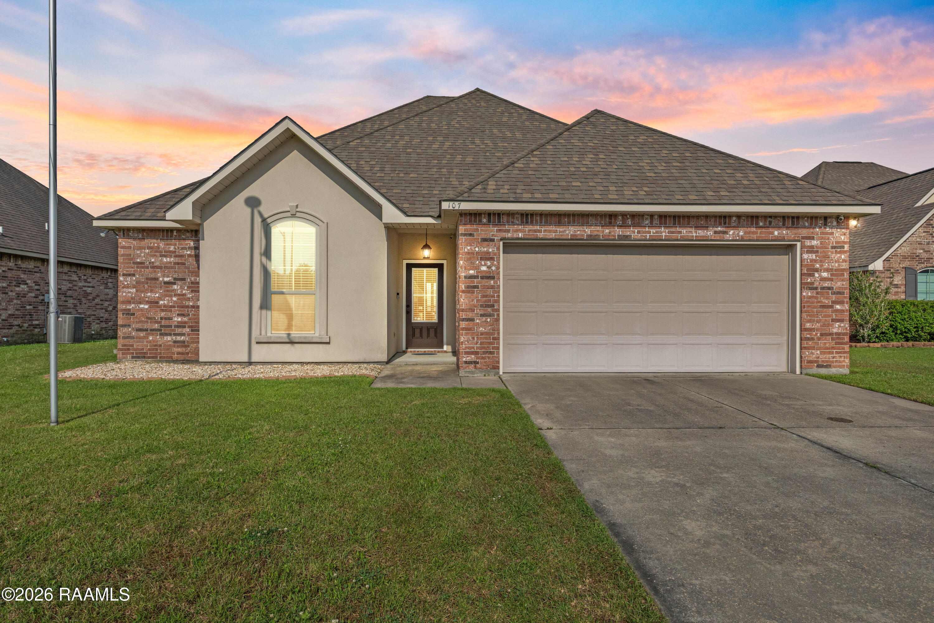 107 Green Mountain Ridge Street Youngsville, LA 70592 - Photo 1 of 25 twilight