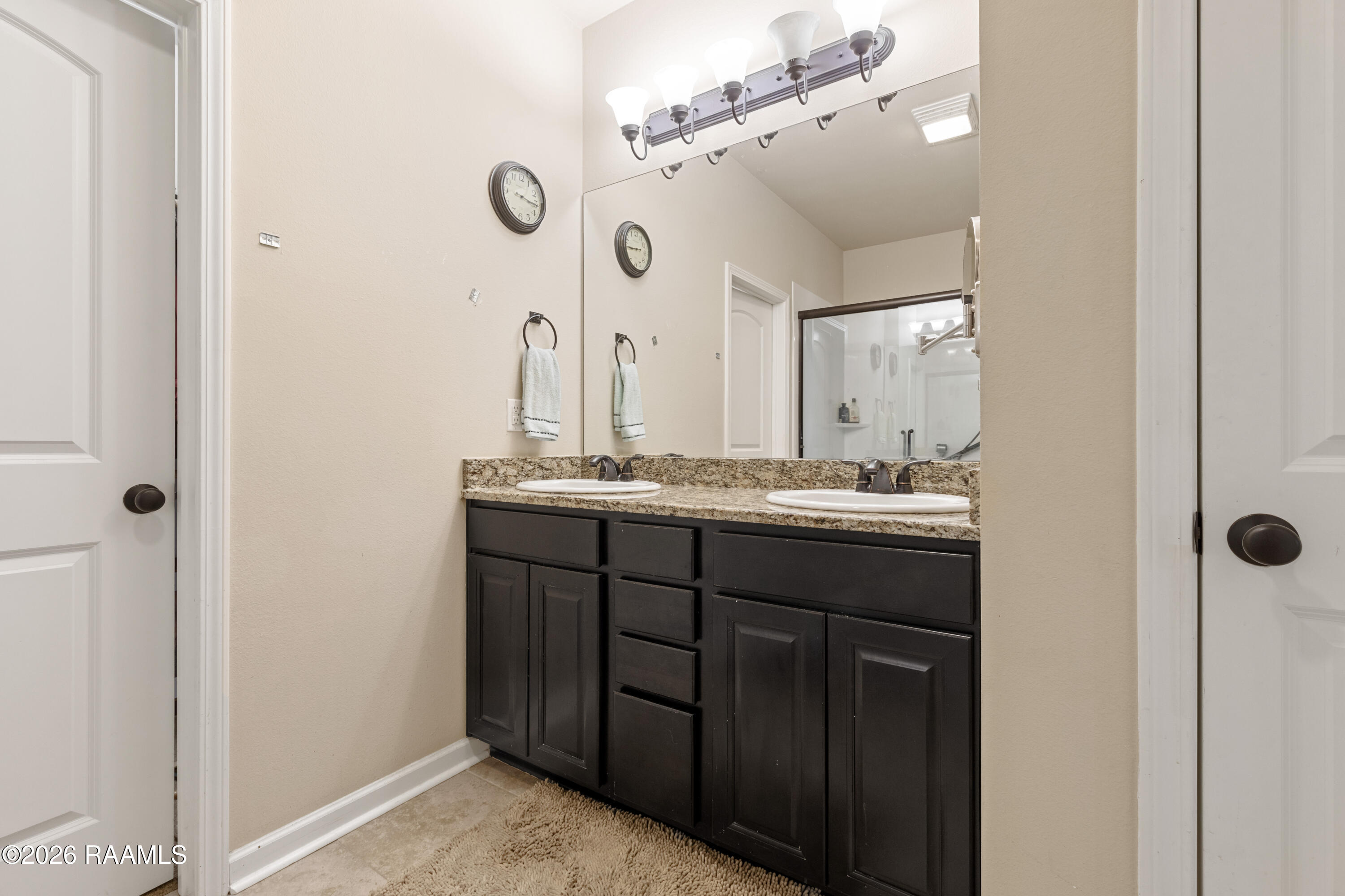 107 Green Mountain Ridge Street Youngsville, LA 70592 - Photo 15 of 25 Primary Double Vanity