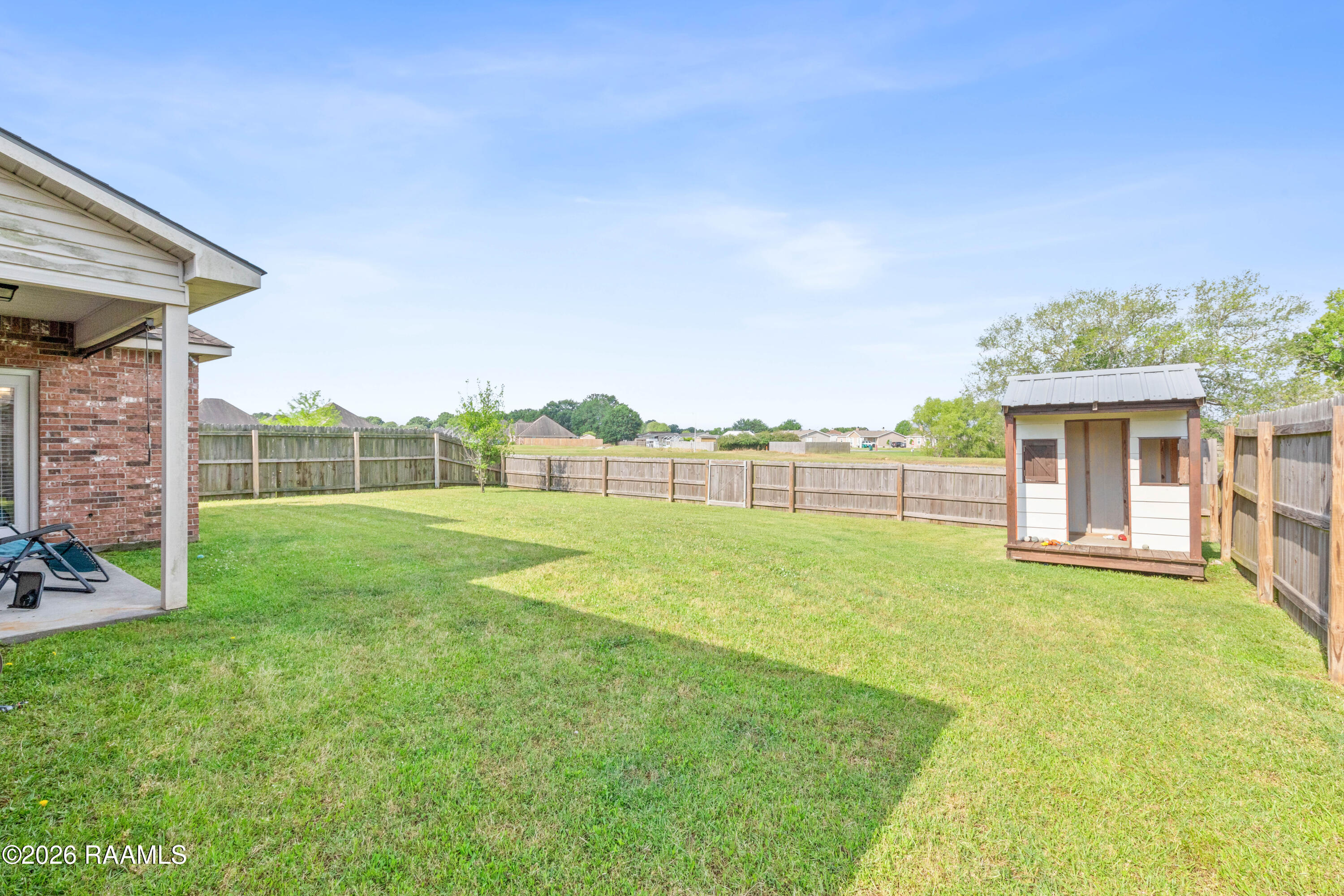 107 Green Mountain Ridge Street Youngsville, LA 70592 - Photo 22 of 25 Backyard View