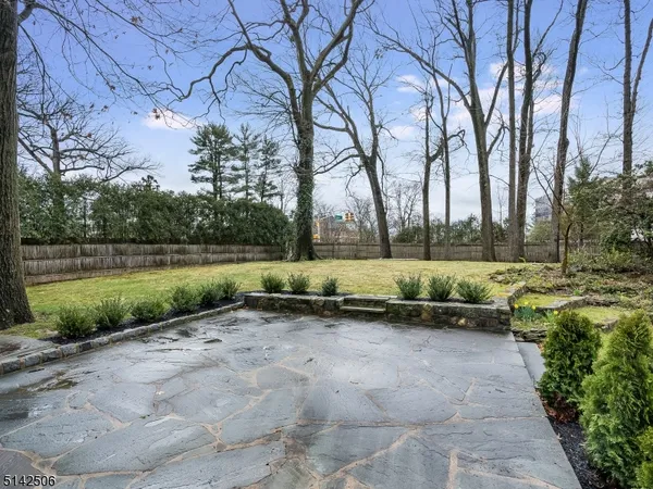 a view of a yard with green space