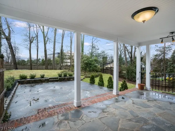 a view of a porch with furniture