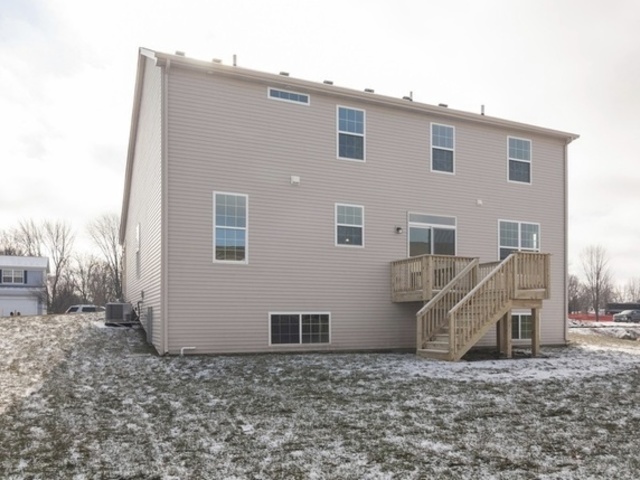 3118 Patterson Road Montgomery, IL 60538 - Photo 2 of 23 a view of a house with a yard
